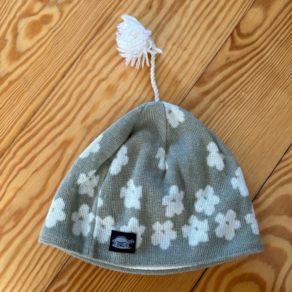 Turtle fur beanie hat with tassel